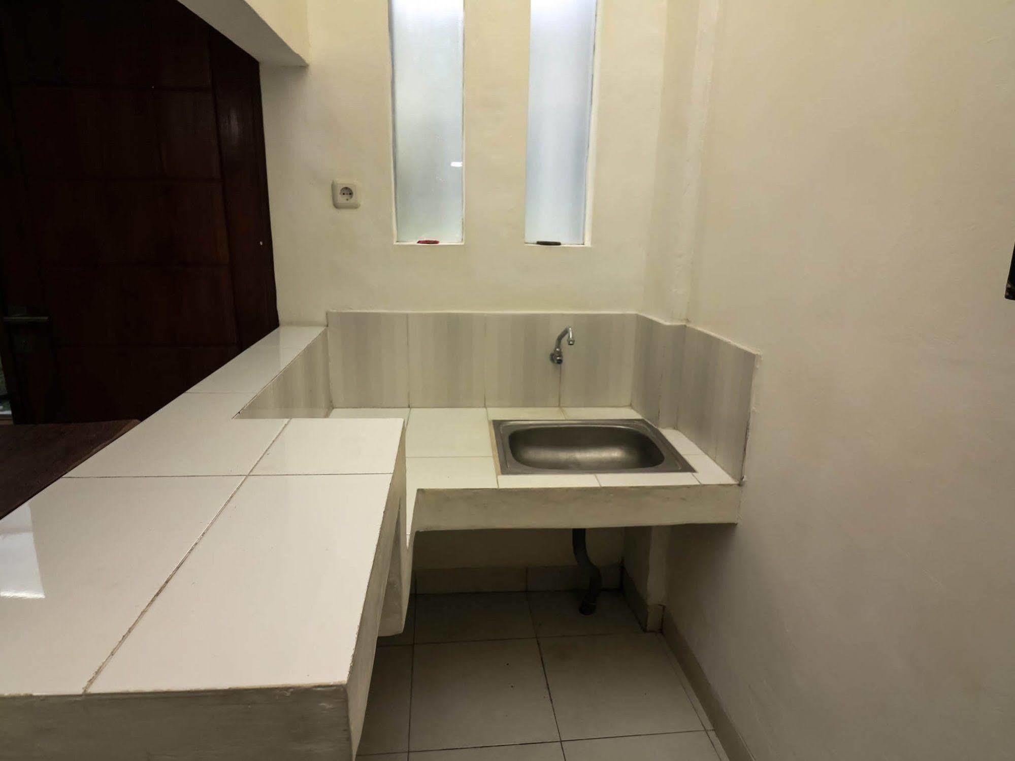 Super Oyo 91495 Hotel Indah Residence دنباسار المظهر الخارجي الصورة